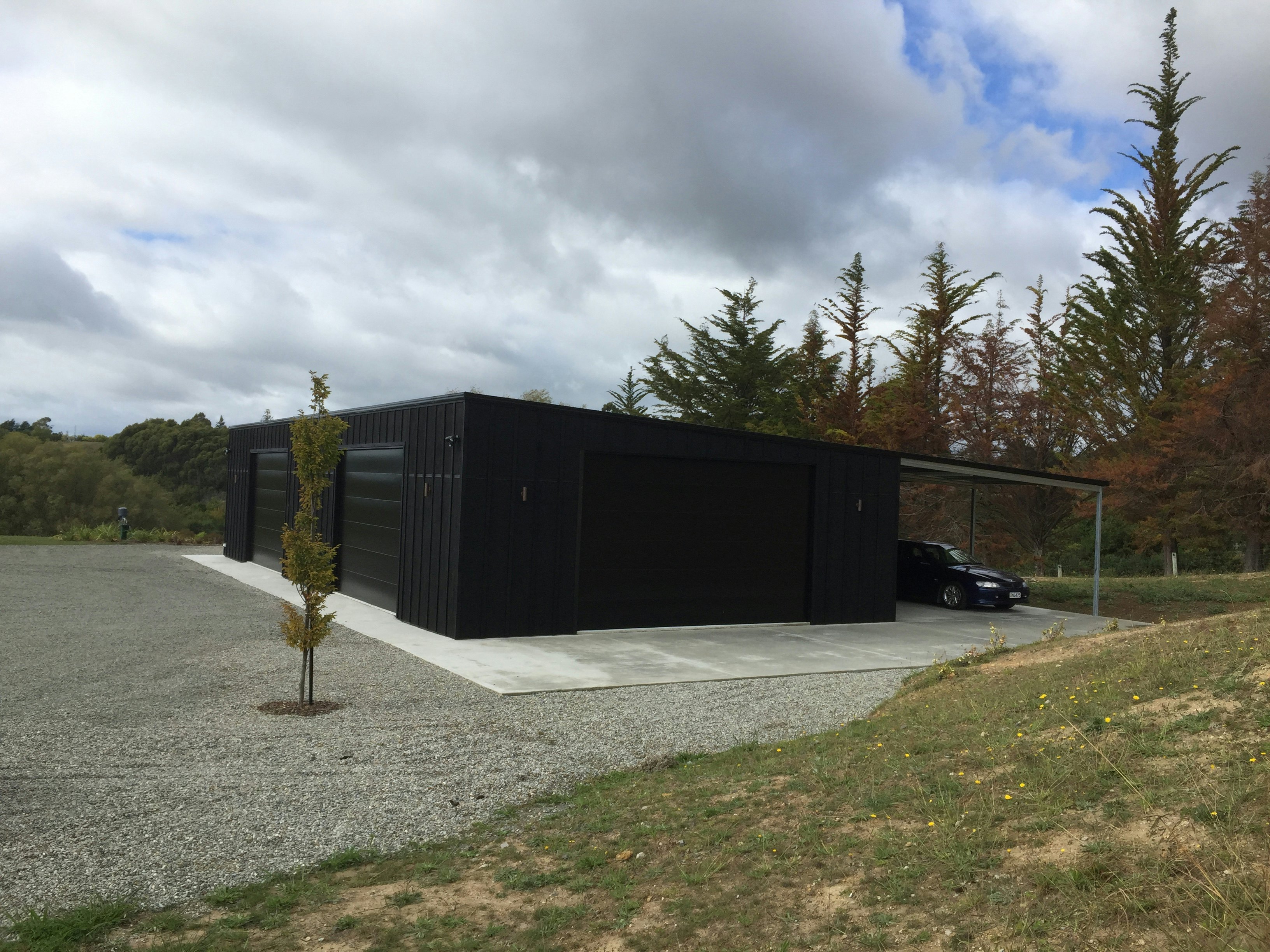 17.5mW x 9m Deep x 3.6mH with an awning, specific design clad in board and batten